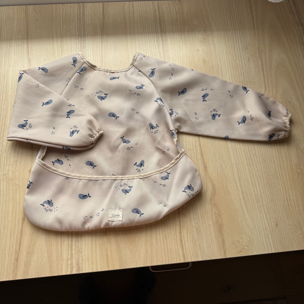 Mushie Long-Sleeve Waterproof Bib with Whale Print - Cream/Blue